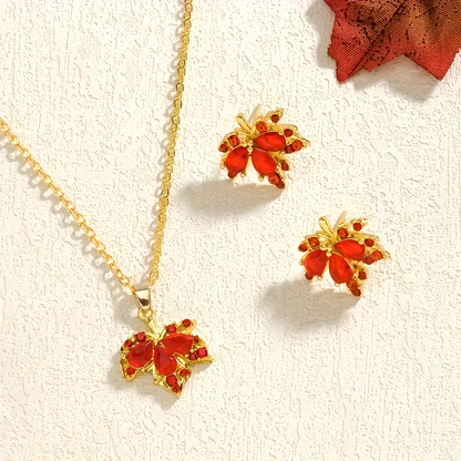 Dilove Zarif Yaprak Takı Seti – Kırmızı Taşlı Kolye ve Küpe